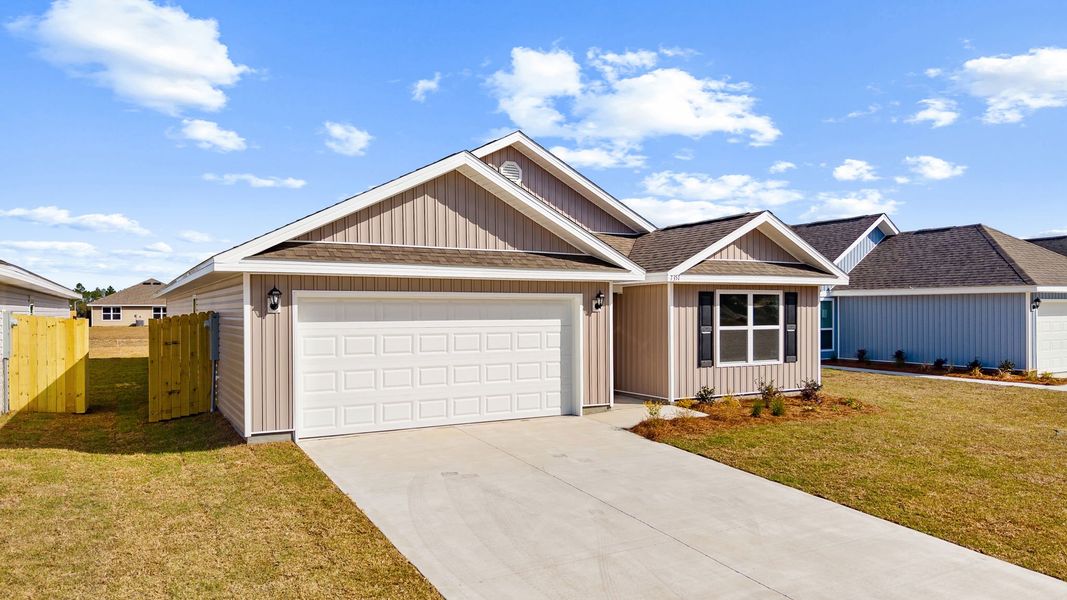 Front exterior of a new home in Morningside, Panama City, FL, highlighting curb appeal (Image 2). Front exterior of a new home in Morningside, Panama City, FL, highlighting curb appeal (Image 2).