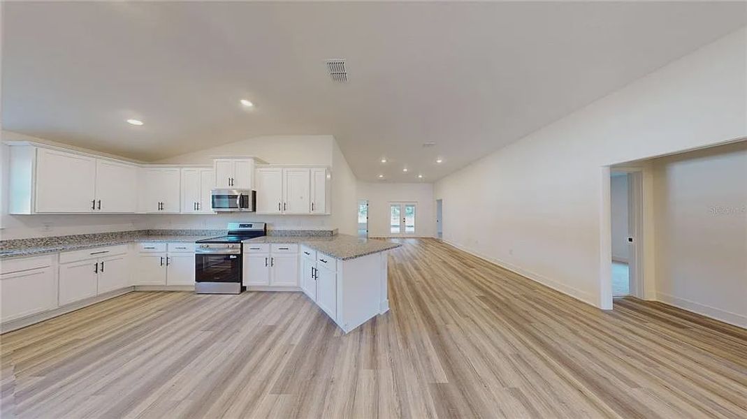 Furnished interior view inside a new home in Briarwood, Alachua (Image 9).