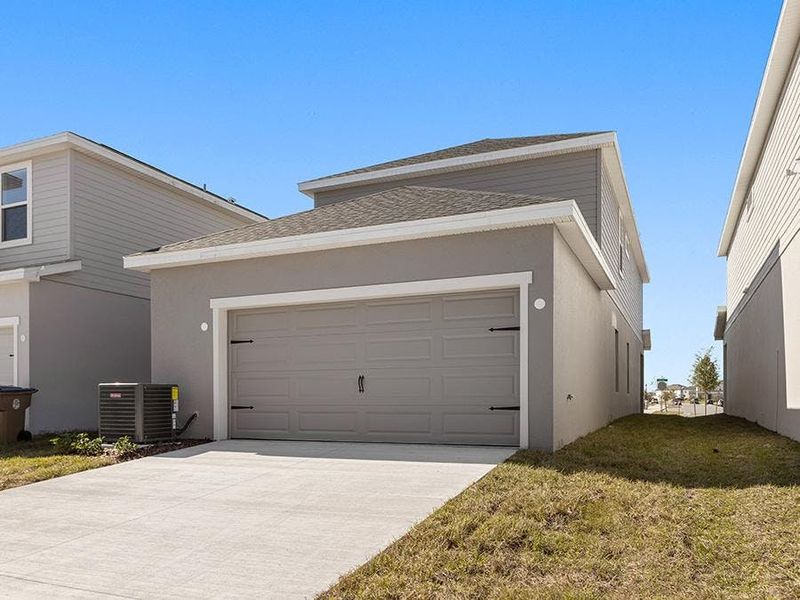 The Capribungalow includes an attached 2-car garage, located at the rear of the home.