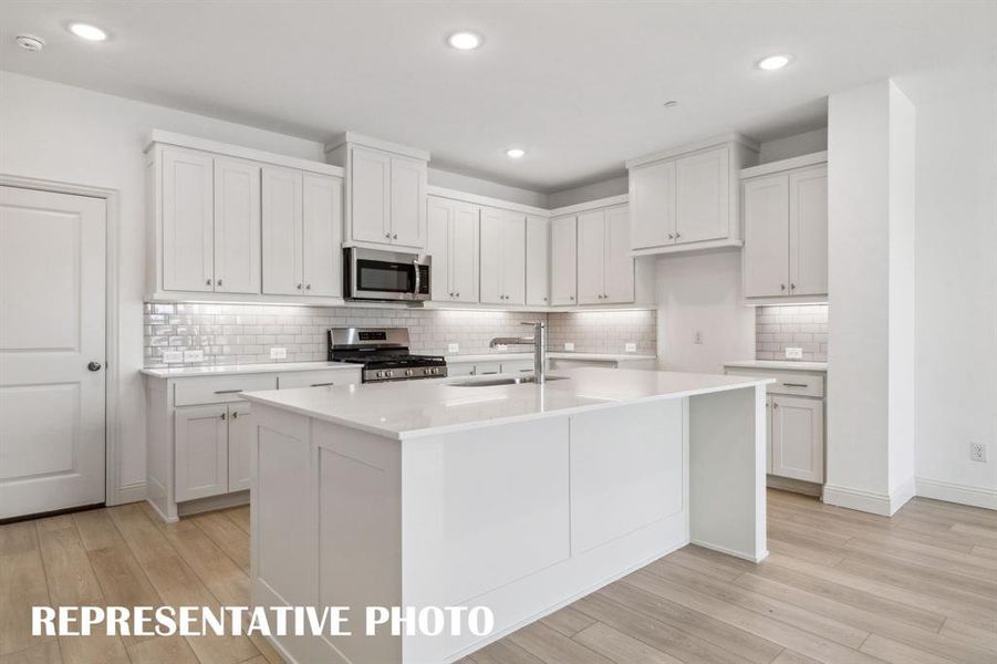 No shortage of storage or prep space in this dream kitchen!  REPRESENTATIVE PHOTO