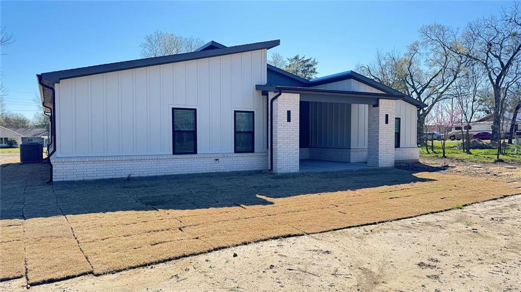 Front exterior of a new home in , Farmersville, TX, highlighting curb appeal (Image 24). Front exterior of a new home in , Farmersville, TX, highlighting curb appeal (Image 24).
