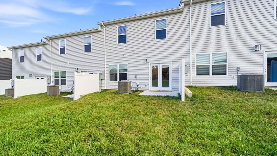 Exterior details and patio area of a home in The Arbor Townhomes, Kingsport (Image 4).