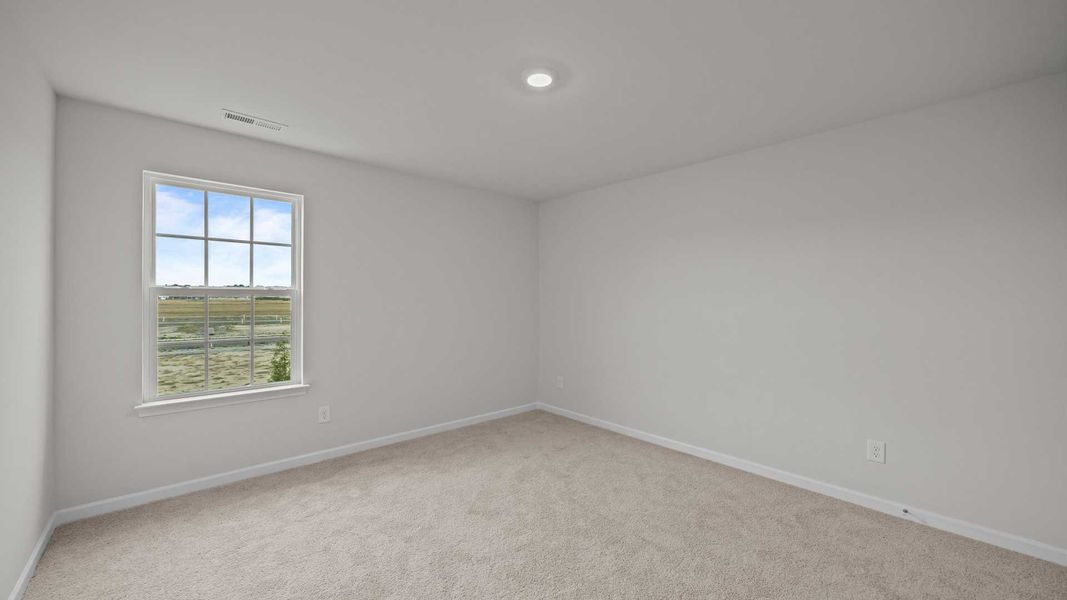 Spacious, unfurnished interior of a new home in Ridgewood Farms, Winterville (Image 25).