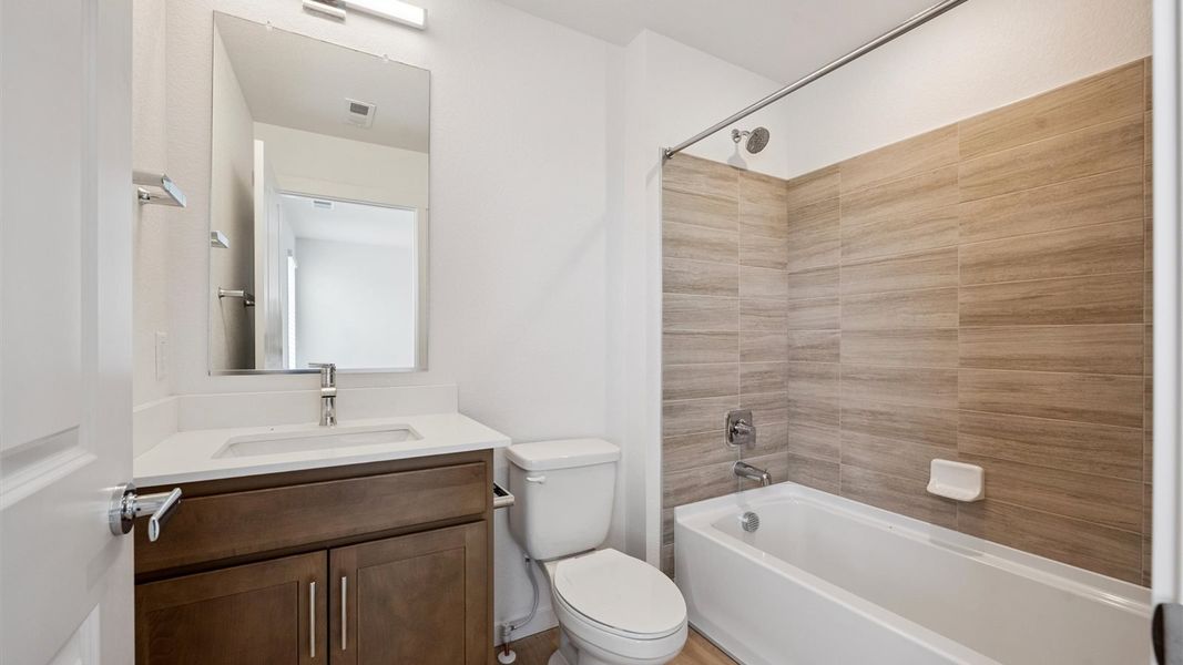 Furnished interior view inside a new home in Trails at Crowfoot, Parker (Image 11).