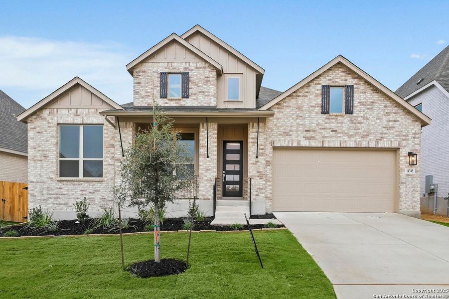Front exterior of a new home in Davis Ranch: 60ft. lots, San Antonio, TX, highlighting curb appeal (Image 1).
