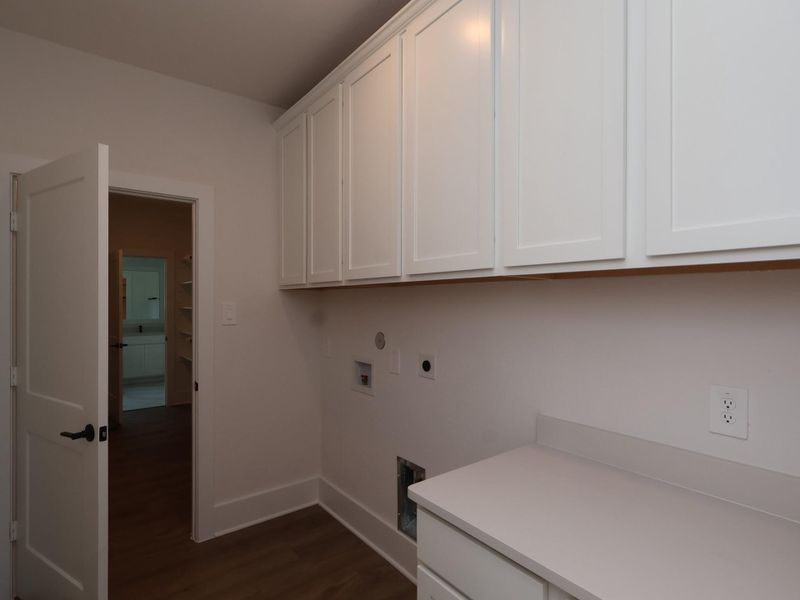 Furnished interior view inside a new home in The Oaks on 6th Street, Magnolia (Image 6).