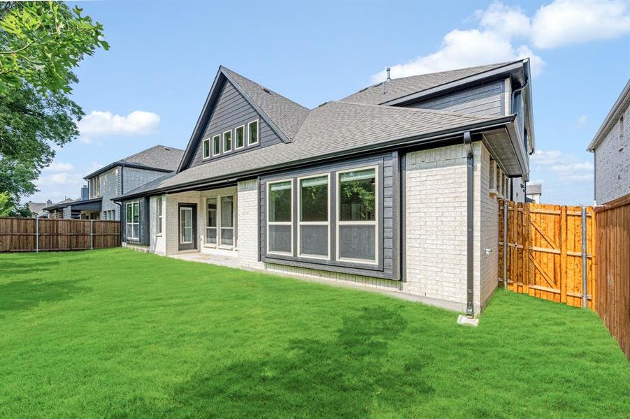 Front exterior of a new home in Legacy Ranch Classic 60, Melissa, TX, highlighting curb appeal (Image 24). Front exterior of a new home in Legacy Ranch Classic 60, Melissa, TX, highlighting curb appeal (Image 24).