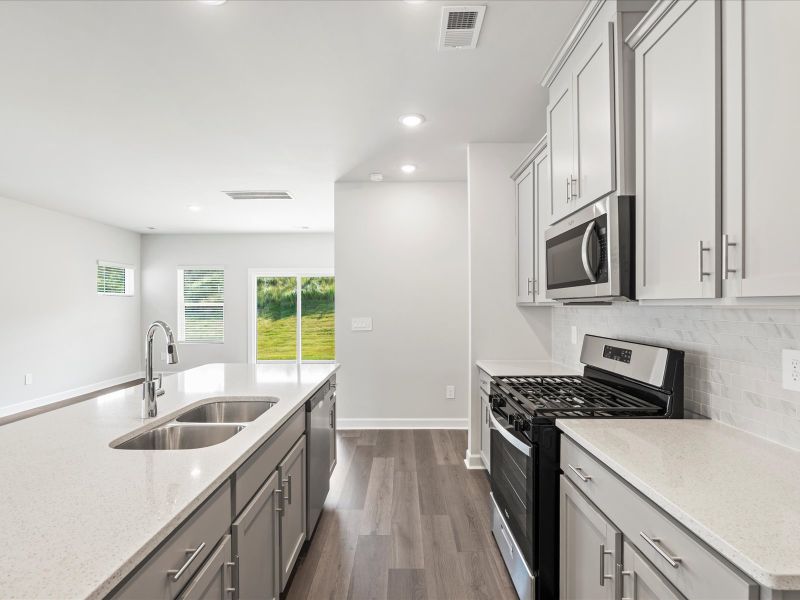 Furnished interior view inside a new home in The Farm at Wells Creek - Heritage Collection, Gray Court (Image 5).