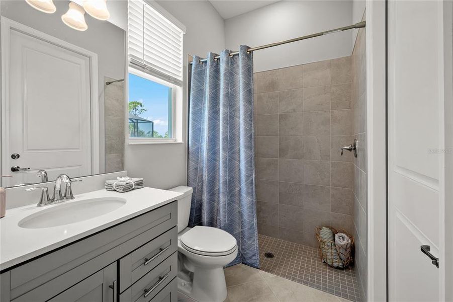 Furnished interior view inside a new home in Calusa Country Club, Lakewood Ranch (Image 29).