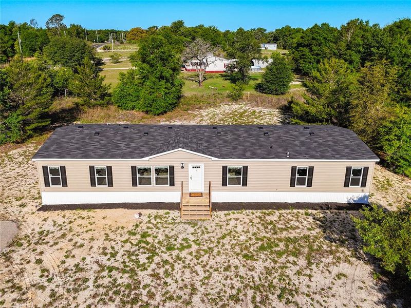 Exterior details and patio area of a home in , Pomona Park (Image 23).