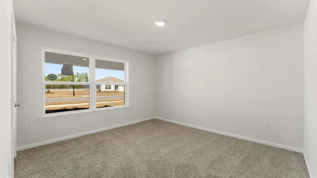 Spacious, unfurnished interior of a new home in Magnolia at the Bluffs Phase 3, Freeport (Image 23). Spacious, unfurnished interior of a new home in Magnolia at the Bluffs Phase 3, Freeport (Image 23).