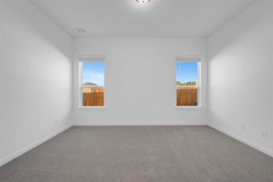 Spacious, unfurnished interior of a new home in Heritage, Dripping Springs (Image 30).