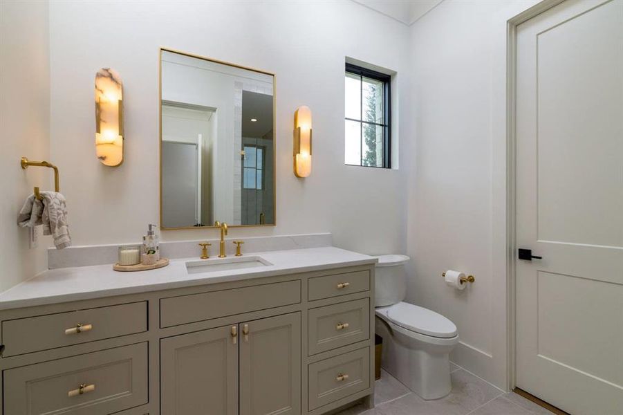 En-suite to the downstairs guest room.