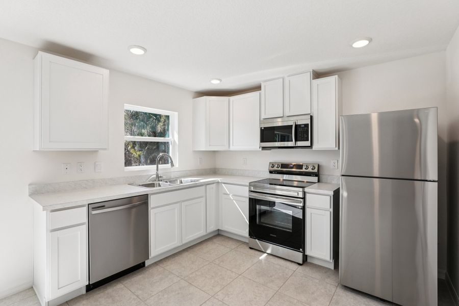 Furnished interior view inside a new home in Vero Lake Estates, Vero Beach (Image 3).