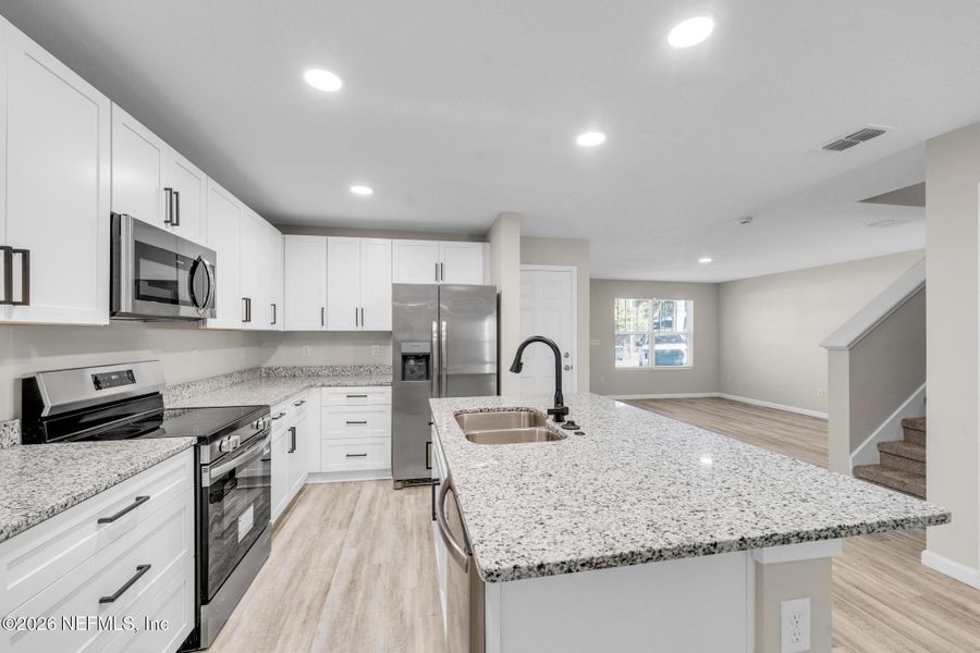 Furnished interior view inside a new home in , Jacksonville (Image 10).