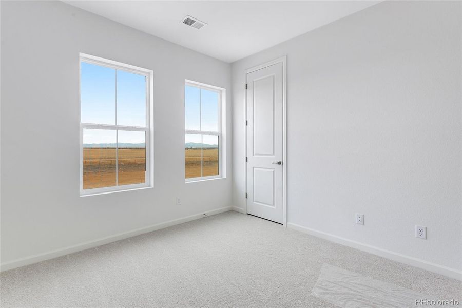 Spacious, unfurnished interior of a new home in Reunion, Commerce City (Image 19).