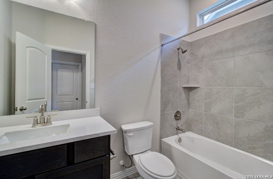 Furnished interior view inside a new home in Stream Waters, Seguin (Image 3).