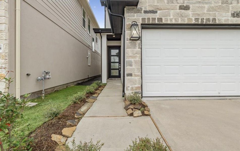 Exterior details and patio area of a home in Park Hill Villas, Stafford (Image 4).