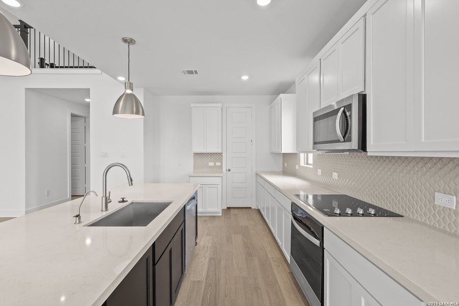 Furnished interior view inside a new home in Megan's Landing, Castroville (Image 7).
