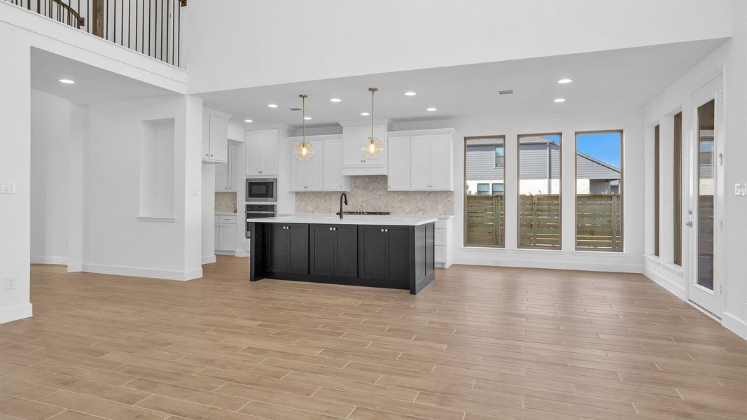 Furnished interior view inside a new home in Austin Point 60', Richmond (Image 7).