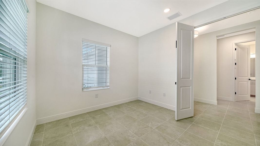 Spacious, unfurnished interior of a new home in Windward Real Estate and Homes for Sale in Sarasota, FL - Neal Communities, Lakewood Ranch (Image 25).