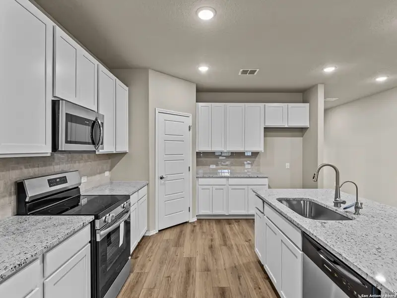Furnished interior view inside a new home in Royal Crest, San Antonio (Image 10).