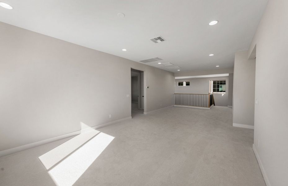 Spacious, unfurnished interior of a new home in Legado West, Queen Creek (Image 24).