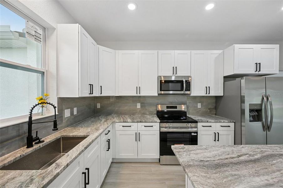 Furnished interior view inside a new home in , North Port (Image 11).