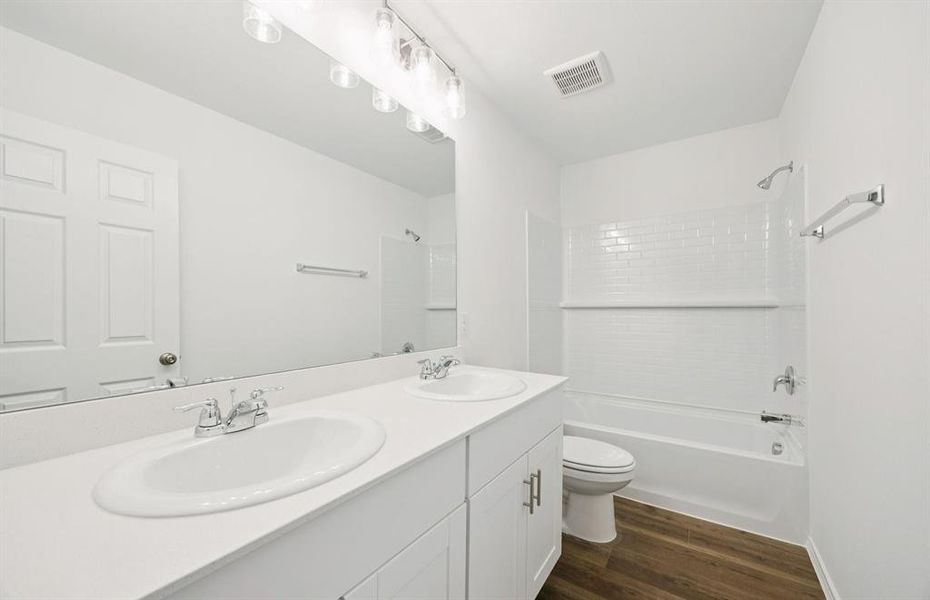 Secondary bath with double sinks Secondary bath with double sinks