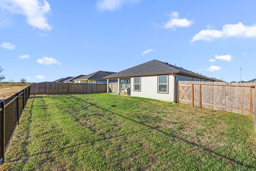Exterior details and patio area of a home in , Sealy (Image 17).