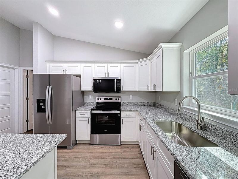 Furnished interior view inside a new home in , Dunnellon (Image 10).