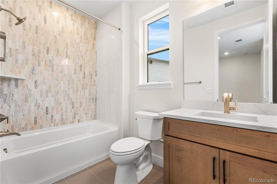 Furnished interior view inside a new home in Autograph at Lyric, Lone Tree (Image 32).