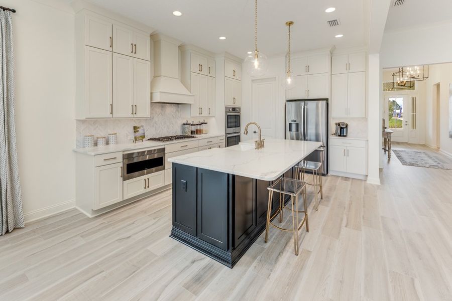 Representative furnished interior of a home built from the Ortega by Riverside Homes in Hidden Creek at SilverLeaf 80' Series, St. Augustine (Image 9).