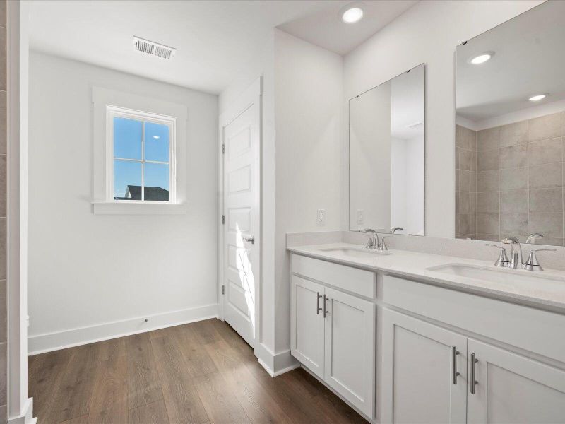 Furnished interior view inside a new home in The Coves at Lakes of Cane Bay, Summerville (Image 6).