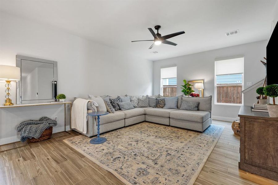 The large living area offers versatile space that can accommodate a variety of furniture arrangements to suit any lifestyle or occasion. Its open design invites creativity in making cozy seating areas or spacious entertainment zones.