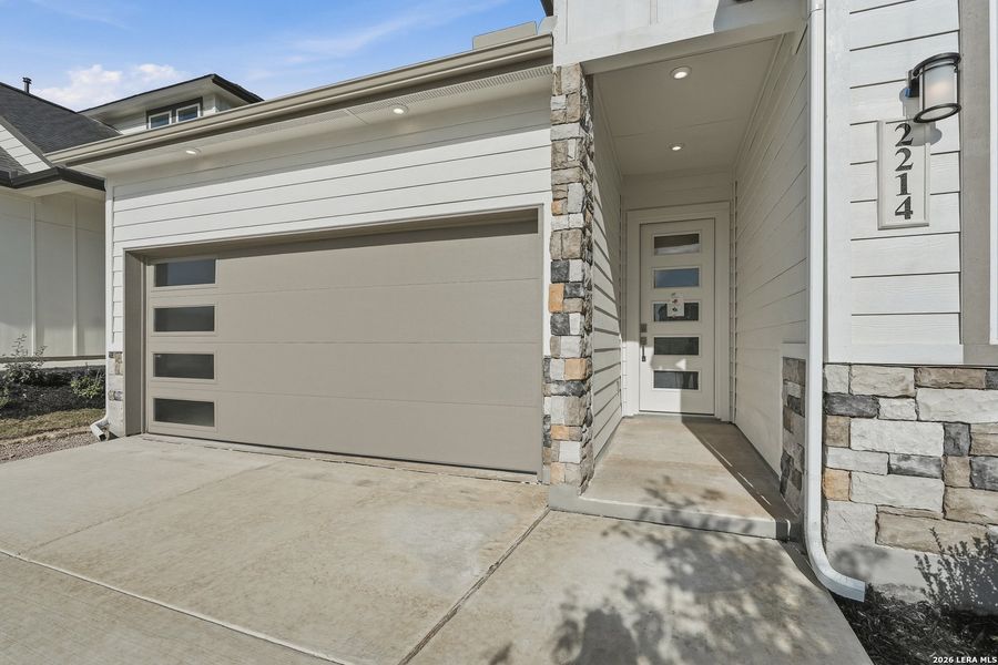 Exterior details and patio area of a home in Prominence, San Antonio (Image 20).