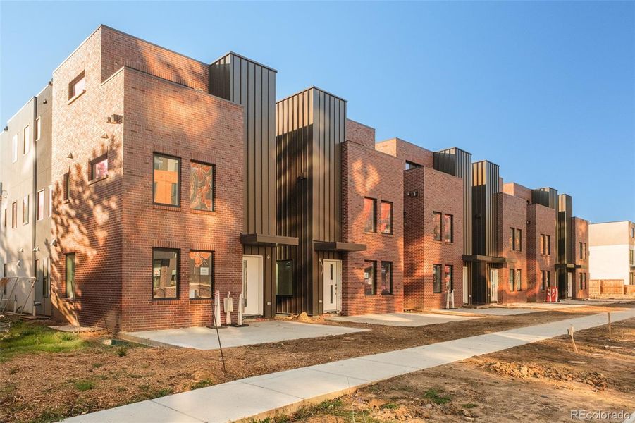 Condo located in Denver, CO showcasing its design and architecture (Image 1).