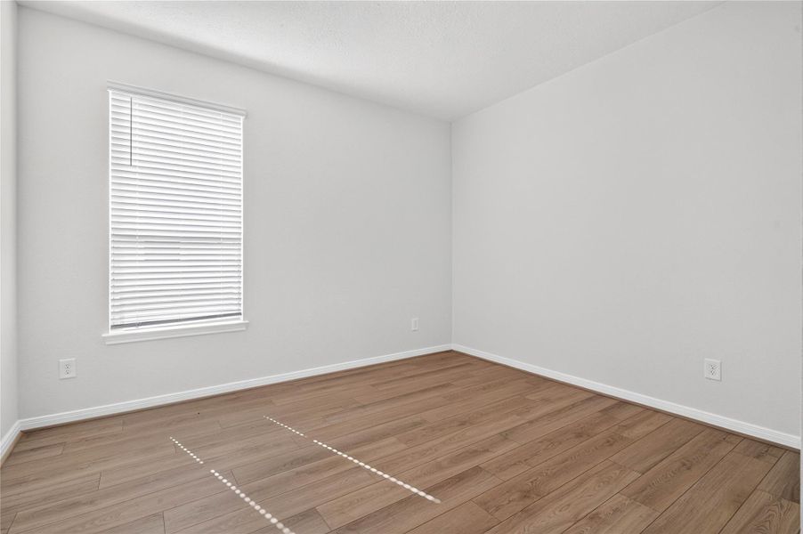 The Den is highlighted by gorgeous vinyl plank flooring, a large window with privacy blinds, and custom neutral paint. The Den is highlighted by gorgeous vinyl plank flooring, a large window with privacy blinds, and custom neutral paint.