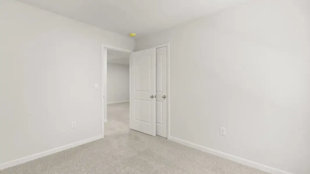 Spacious, unfurnished interior of a new home in Hughes Court, Dawsonville (Image 24).