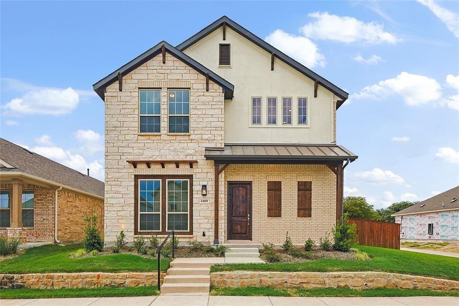 View of front of home with a front lawn