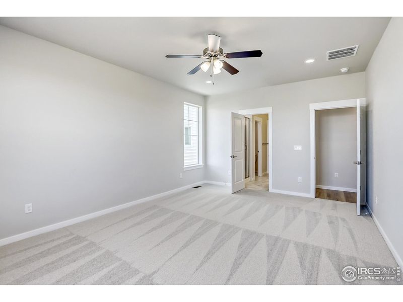 Spacious, unfurnished interior of a new home in Barefoot Lakes, Firestone (Image 26).
