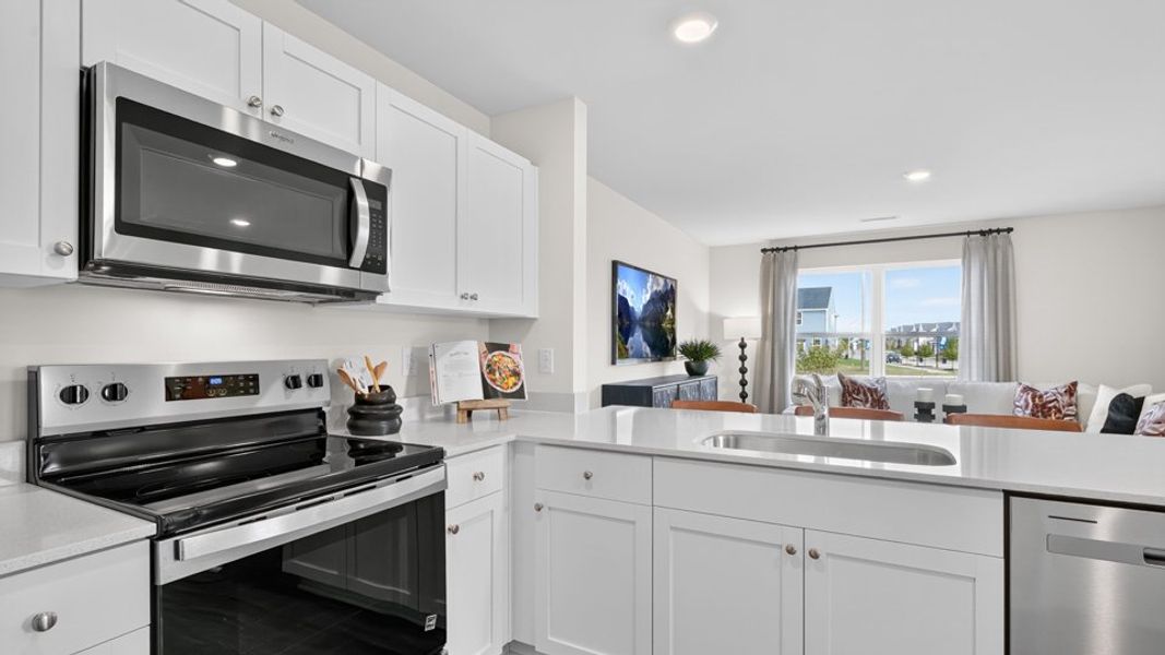 Representative furnished interior of a home built from the PEARSON by D.R. Horton in The Townes at Belle Grove, Wendell (Image 9).