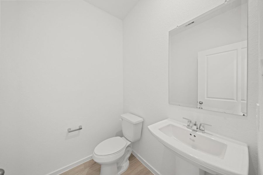 Furnished interior view inside a new home in Sunterra Lakes, Katy (Image 5).