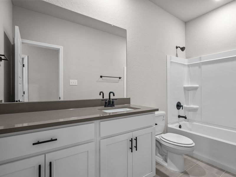Representative furnished interior of a home built from the The Glenwood E by Davidson Homes LLC in Bricewood, San Antonio (Image 13).