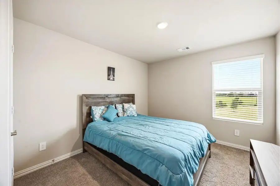 Furnished interior view inside a new home in Briarwood Hills - Highland Series, Forney (Image 13).