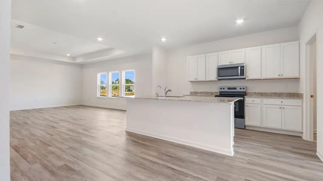 Furnished interior view inside a new home in Owl's Head East, Freeport (Image 4).