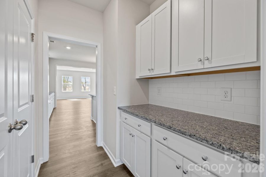 Furnished interior view inside a new home in McFarland Estates, York (Image 8).