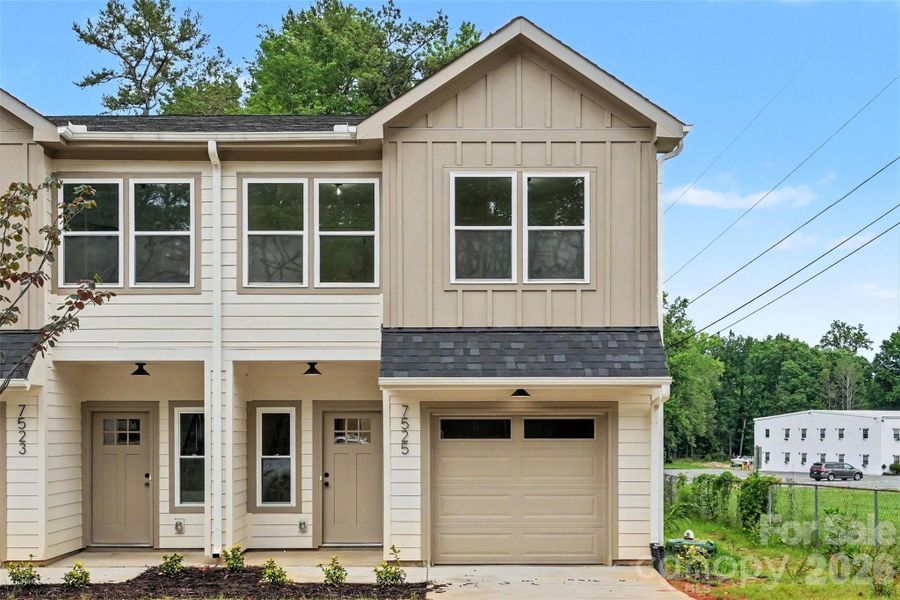 Front exterior of a new home in , Charlotte, NC, highlighting curb appeal (Image 21).