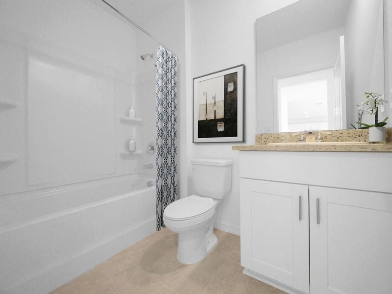 Representative furnished interior of a home built from the Azalea by Taylor Morrison in Palm Wind, Hudson (Image 9).