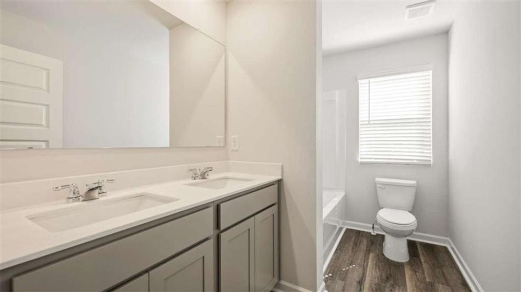 Furnished interior view inside a new home in Poplar Preserve, Newnan (Image 6). Furnished interior view inside a new home in Poplar Preserve, Newnan (Image 6).
